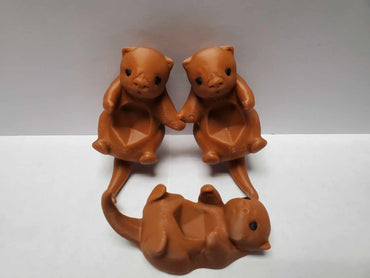 Otters Holding Hands: Dice Holder